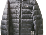 a black jacket hanging on a hanger on a white wall