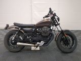 a picture of a motorcycle parked in a garage