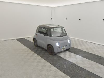 a small car that is sitting in a room