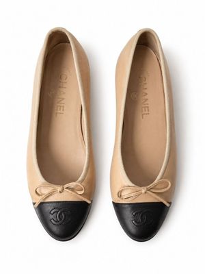 chanel beige and black leather ballet shoes with bow detail