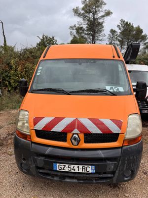 an orange van that is parked on the side of the road
