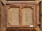 an old wooden picture frame with two empty pictures in it