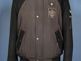 black and grey bomber jacket on a mannequin stand