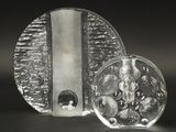 two pieces of glass sitting on top of each other