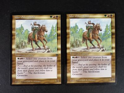 two cards that have a picture of a man on a horse
