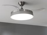 a close up of a ceiling fan with a light on it