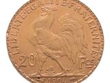 l'image d'une pièce d'or ornée d'un coq