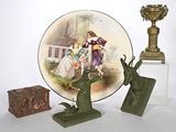 a plate with a picture of a man and a woman on it