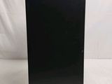 a black computer case sitting on a white surface