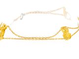 the gold chain bracelet has a horse on it and is attached to a chain