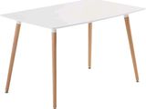 La table est blanche, avec des pieds en bois et un plateau blanc.