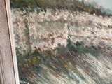 a picture of a painting on the wall of a room