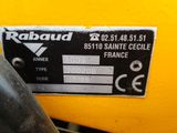 a close up of a label on a yellow motorcycle