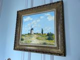a picture of a painting hanging on the wall of a room