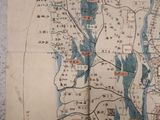 an old map of a large body of water with a lot of land in it
