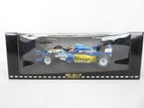 a close up of a box with a model of a racing car