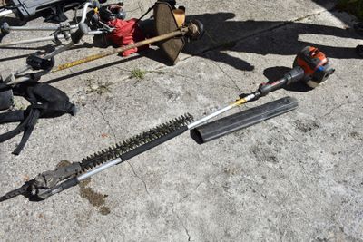 a lot of tools that are laying out on the ground
