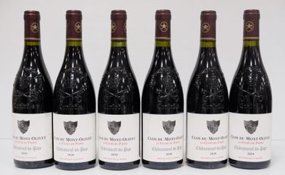 six bottles of wine are lined up in a row on a white surface