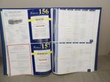 a blue folder with two pages of information on it