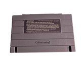 a nintendo game console sitting on top of a white table