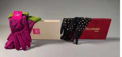 two pairs of gloves and a box with a tie on it
