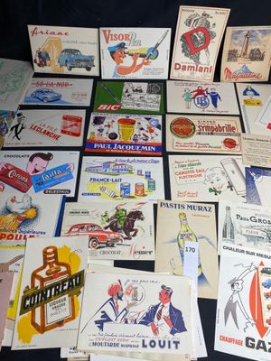 many different types of advertising cards on the table