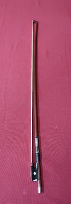 a picture of a pair of scissors on a pink surface