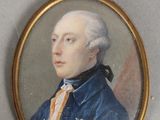 deux portraits miniatures d'un homme vêtu d'un costume bleu et d'une cravate