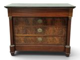 an image of a wooden chest of drawers with a marble top
