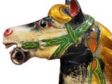 a wooden horse head with a colorful design on it