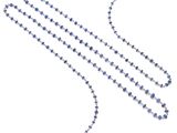 a close up of a blue beaded necklace on a white background