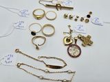 many different types of jewelry on display on the table