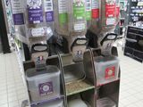 many containers of food on the shelves in the store