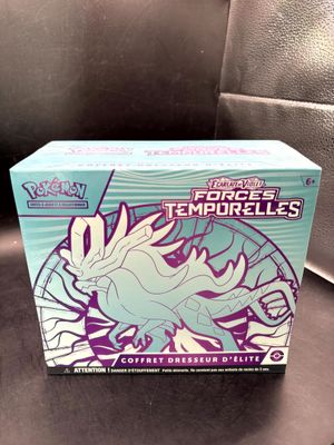 a close up of a box of pokemon toys on a table
