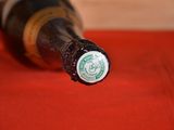 a bottle of beer that is sitting on a table