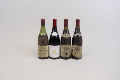 trois bouteilles de vin sont alignées sur une surface blanche