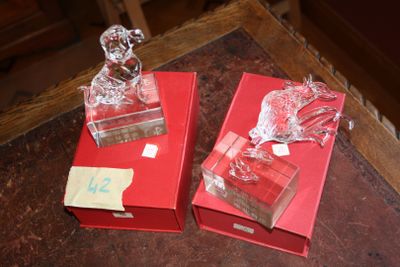 two red boxes that are sitting on a table