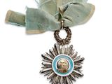 une médaille sur laquelle figure l'effigie d'un homme