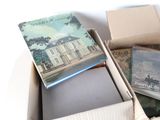 a box of books sitting on top of a table