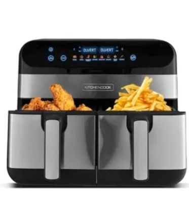 an air fryer with fries and french fries in it