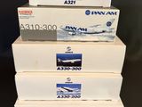 four boxes of air new zealand airliner jetliners stacked on top of each other