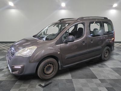 a grey van that is parked in a room