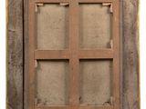an old wooden window frame with a window pane in the middle