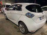 a white car that is parked in a garage