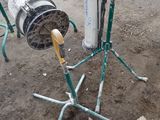 a picture of a machine that is sitting in the dirt