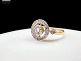 an image of a diamond ring on a white plate