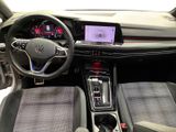 the interior of a car with a steering wheel, dashboard, and dashboard controls