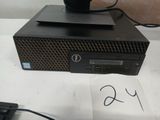 a computer on a table with a keyboard and mouse