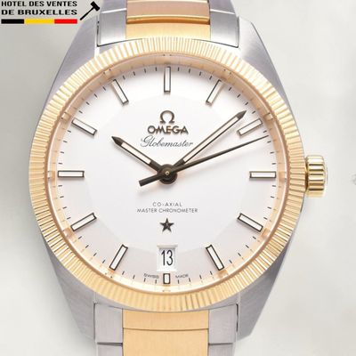 an image of a close up of a watch on a white surface