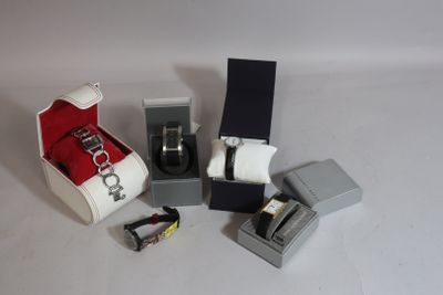 a box with a watch and a ring inside of it